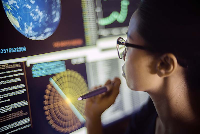 Climate disclosure and ISSB, the end of 
 greenwashing? Photo of young woman looking at global data screen