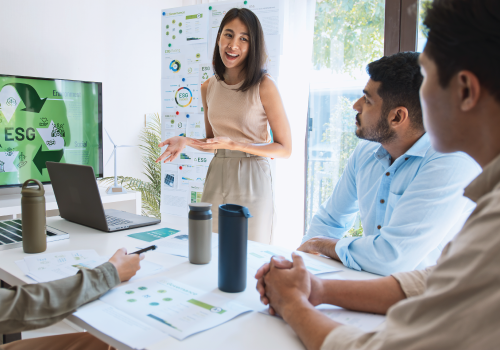 A meeting being held on how to incorporate ESG into business practices.